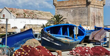 Small fishing boat near the port in essaouira Small fishing boat near the port in essaouira